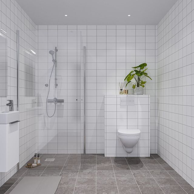Bad med hvit fliser på vegger